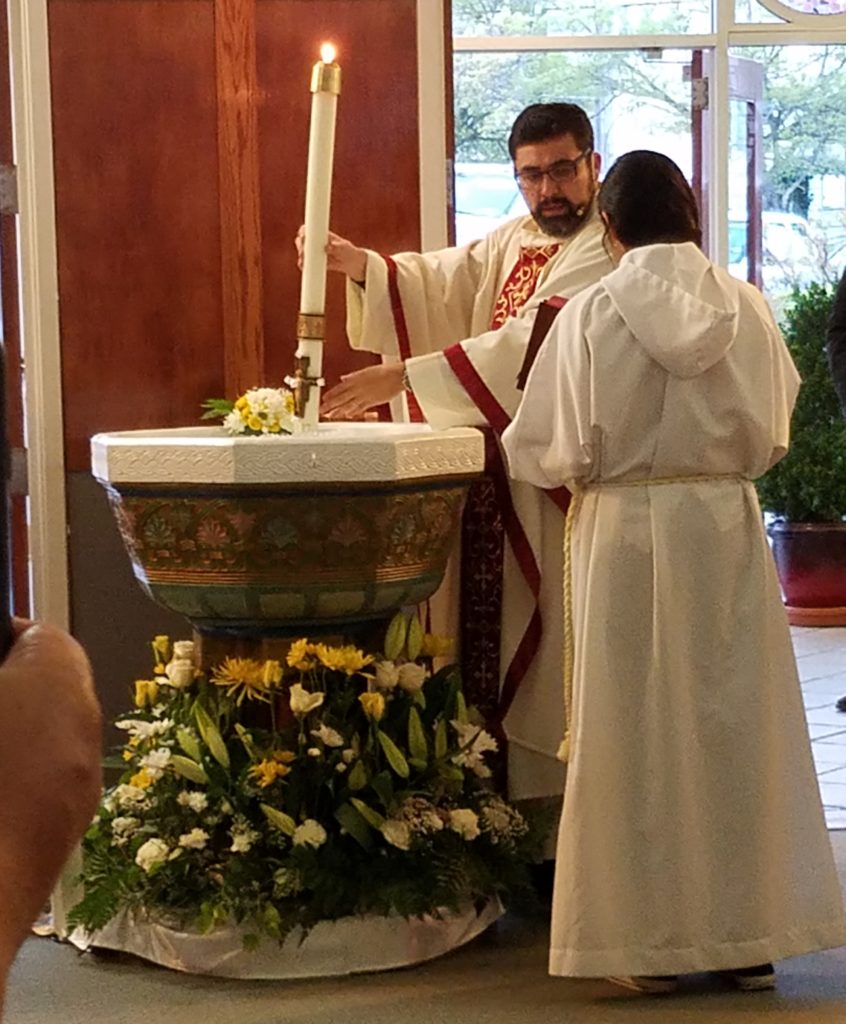 Blessing The Baptismal Waters with the Pascal Candle – StMarysLakeport